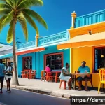 세인트루시아에서 인터넷 속도 - A vibrant urban scene in Castries, St. Lucia, showing a modern caf&eacute; with tourists and locals using l...